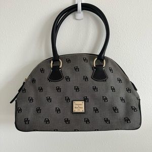 Dooney and Bourke dome monogram bag. Great used condition.